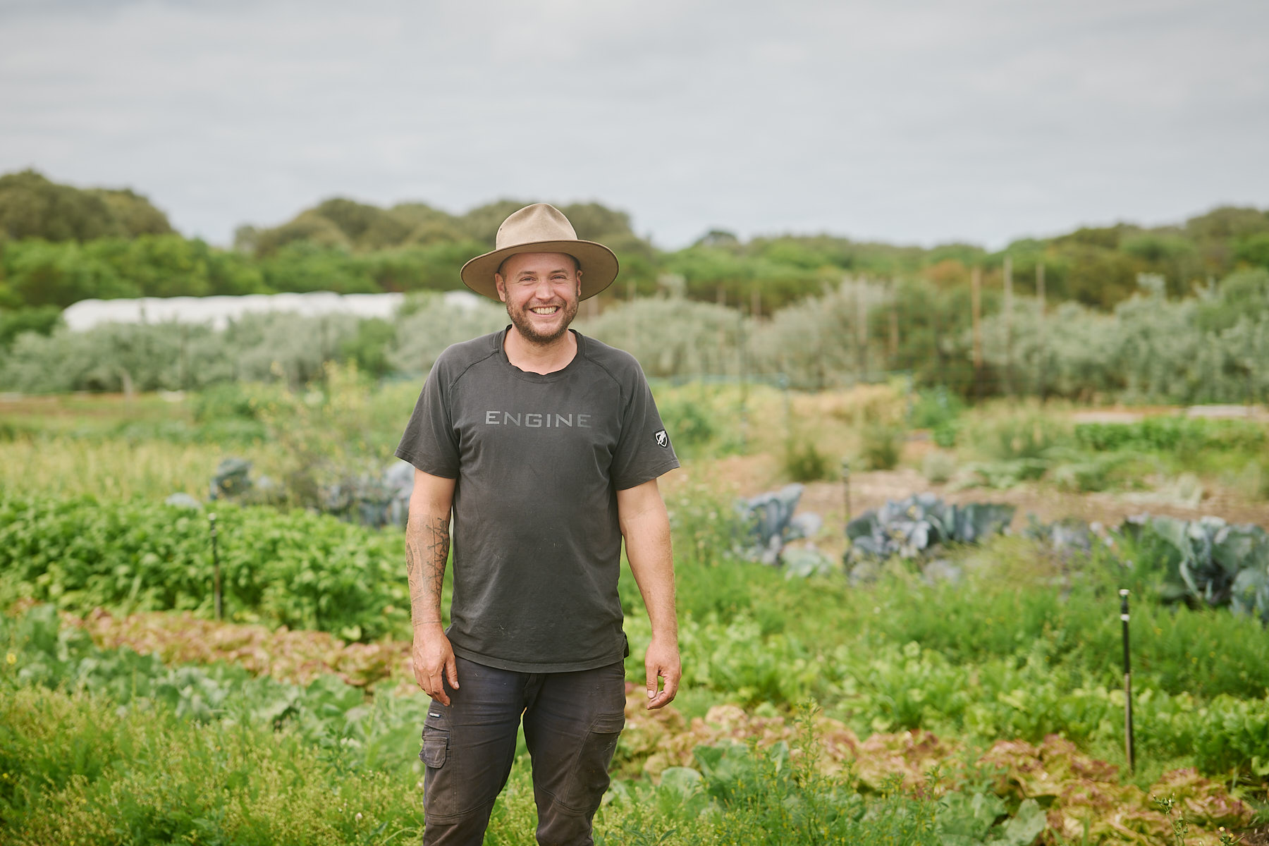 Chef Simone picking tomatoes